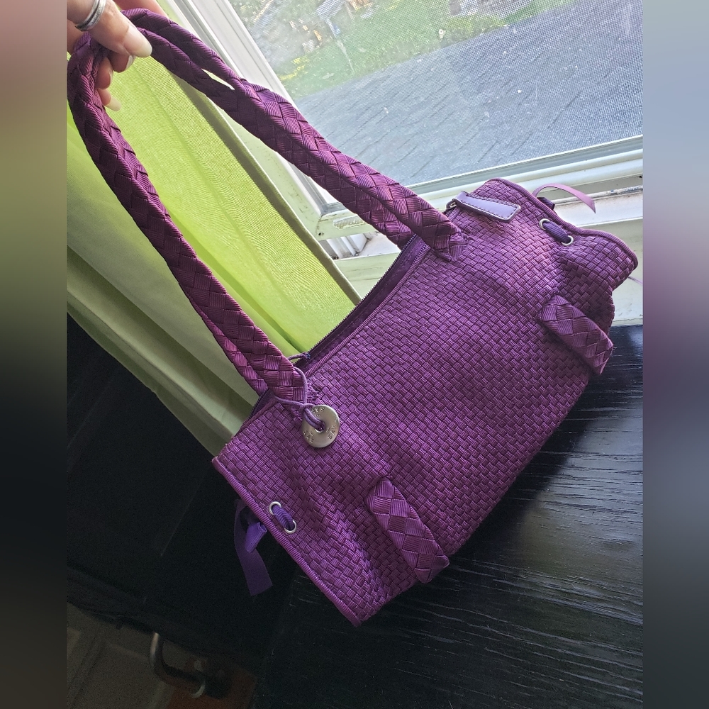 The Sak purple barrel bag